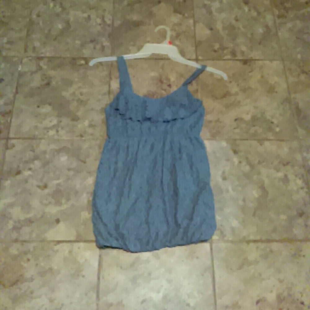 Blue lacey tank top. Rounded bottom